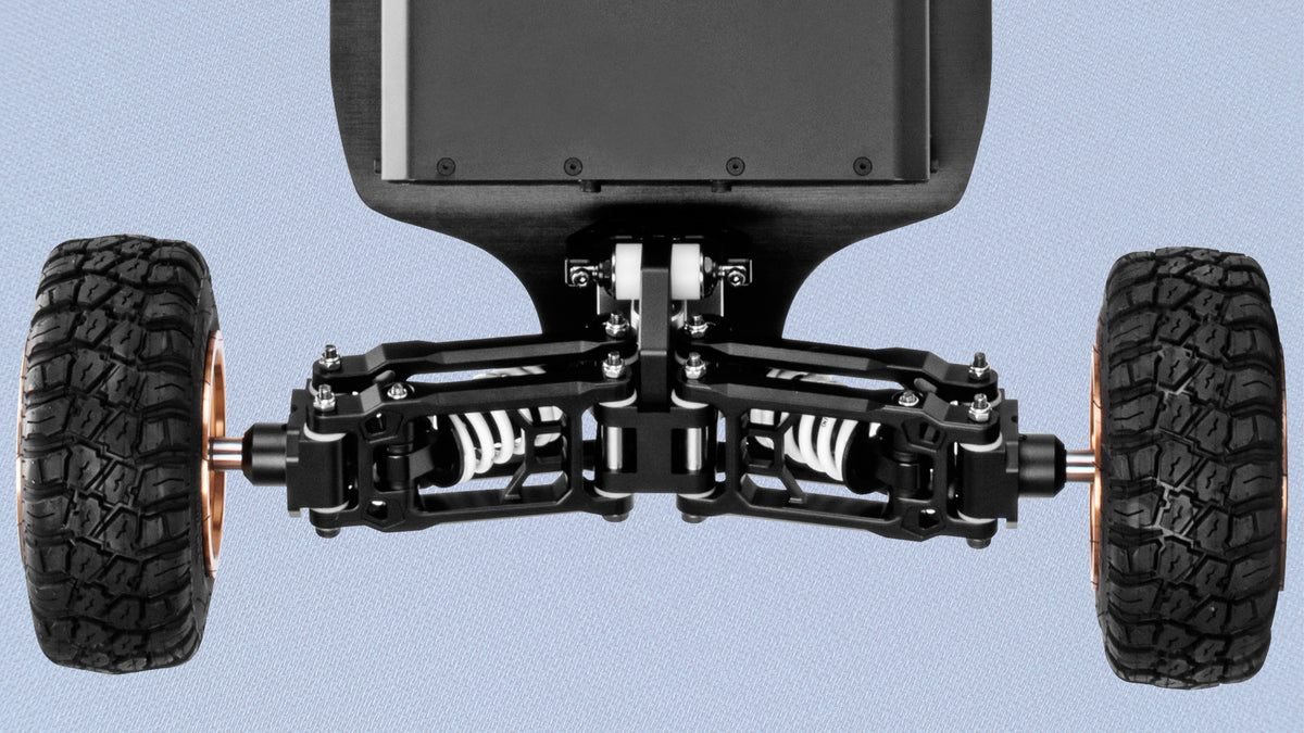THE DETAILS — independent arms articulate without cross-wheel interference